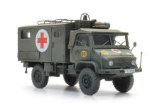 Artitec 6870778 - H0 - Unimog 404s mit Krankenwagen, BRD - gelboliv